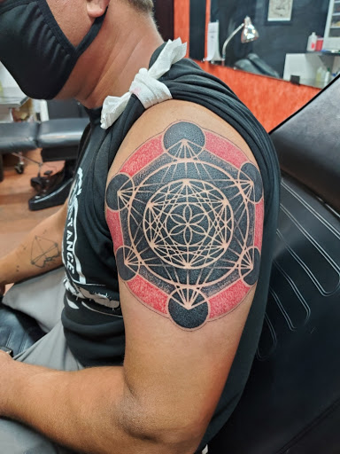 Explore shoulder tribal tattoo ideas, creative tattoo ideas in Sedona, available at Physical Graffiti Tattoo