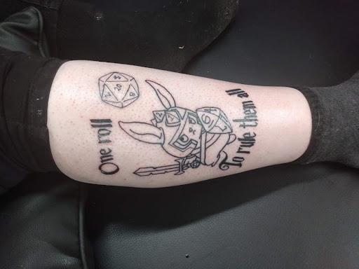 Explore mardi gras mask tattoo ideas, creative tattoo ideas in Cadillac, available at Warchief Tattoo, LLC