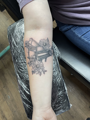 Explore eagle feather tattoo ideas, creative tattoo ideas in Wills Point, available at Ink Insurgency