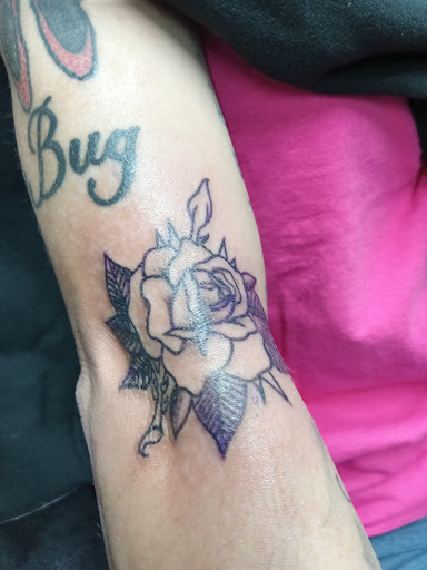 Explore catfish tattoo ideas, creative tattoo ideas in Hamilton, available at A New Part of You Tattoos and Piercings