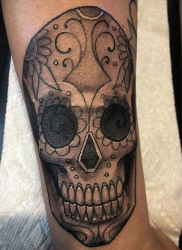 Explore stomach tattoo ideas for females, creative tattoo ideas in San Diego, available at Sideshow Tattoo and Piercing