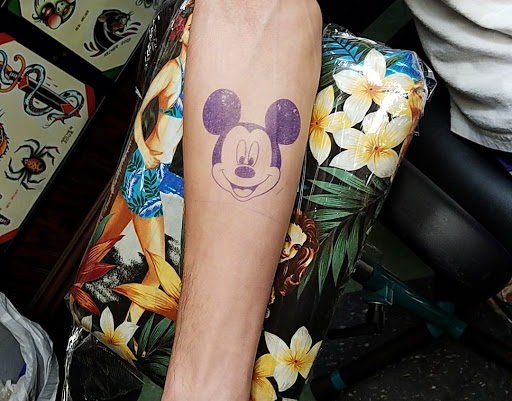 Explore forearm tattoo cover up ideas, creative tattoo ideas in Saint Louis, available at Trader Bobs Tattoo Shop