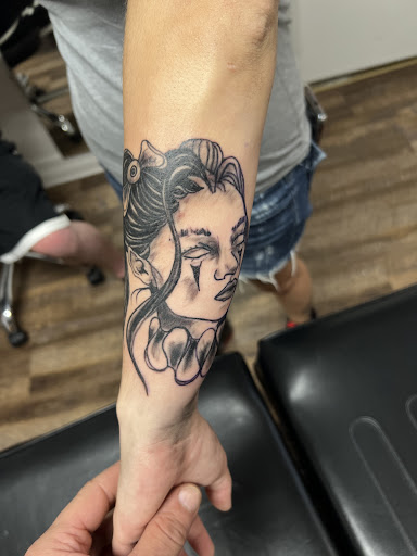 Tattoo Shop «Sacred Art Tattoos», reviews and photos, 897 W McClain Ave, Scottsburg, IN 47170, USA