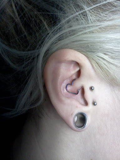 Explore sleeve tattoo ideas male, creative tattoo ideas in Charleston, available at Exotic Impressions Body Piercing