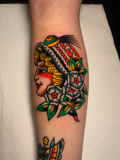 Explore salmon tattoo ideas, creative tattoo ideas in Greenville, available at The Gallery Tattoo Greenville