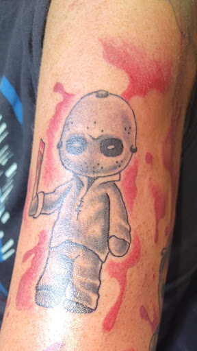 Explore ace tattoo ideas, creative tattoo ideas in Angola, available at Hoodlum Ink