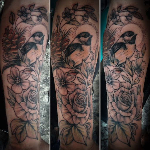 Find tattoo skull ideas for your next unique tattoo in Lander at Blackblood Tattoo and Piercing