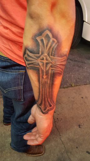 Explore leopard tattoo ideas, creative tattoo ideas in Houston, available at 3rd Coast Custom Tattoos & Body Piercings Studio