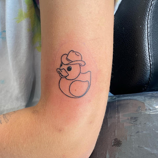 Explore color flower tattoo ideas, creative tattoo ideas in Niles, available at 3 Shades of Black Tattoo Studio