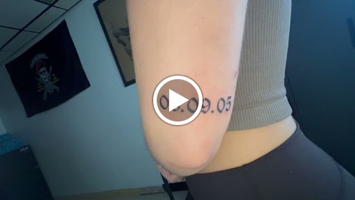 Explore book dragon tattoo ideas, creative tattoo ideas in Orange, available at Top Floor Tattoo Studio