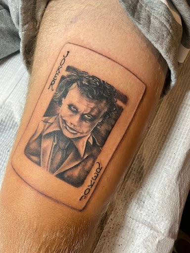 Explore boxing gloves tattoo ideas, creative tattoo ideas in Fort Collins, available at Solana Tattoo Company