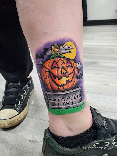 Explore snake tattoo ideas for men, creative tattoo ideas in Lombard, available at New Hope Tattoo