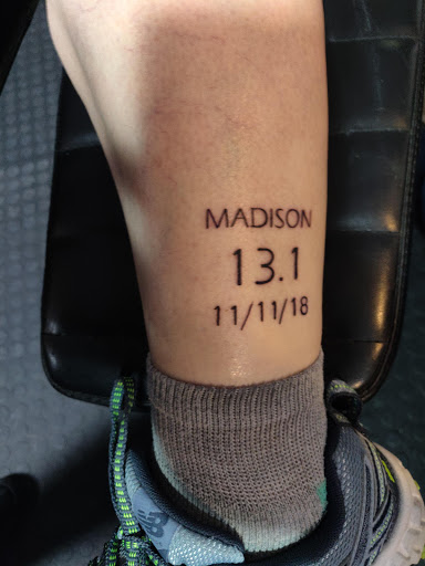 Explore under breast tattoo ideas for females, creative tattoo ideas in Rockford, available at Euro Tattoo