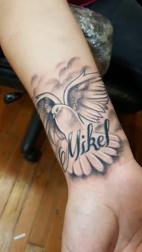 Tattoo Shop «Beautiful Sin Tattoos», reviews and photos, 245 N Queen St, Lancaster, PA 17603, USA