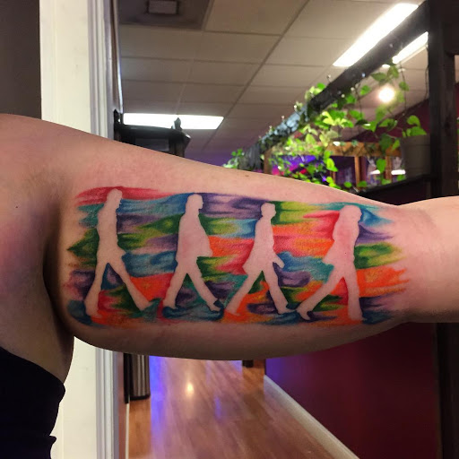 Explore full neck tattoo ideas for men, creative tattoo ideas in Redding, available at The Salty Sloth Tattoo