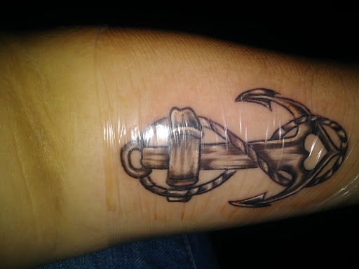 Explore number 4 tattoo ideas, creative tattoo ideas in Pigeon Forge, available at Black Orchid Tattoo Studio