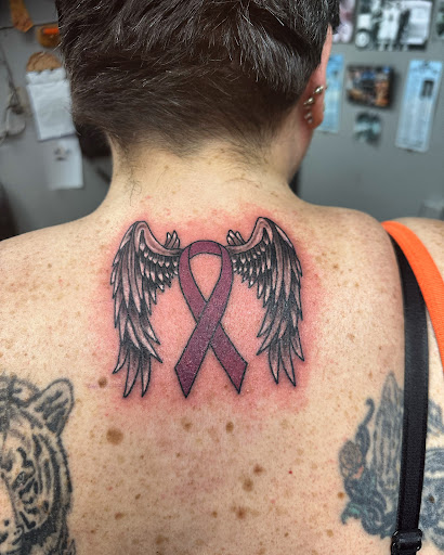 Explore athlete tattoo ideas, creative tattoo ideas in Hudson Falls, available at ALTERED ADDICTION TATTOOS