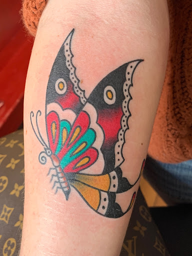 Explore cool arm sleeve tattoo ideas, creative tattoo ideas in Russellville, available at Smoky Row Tattoo