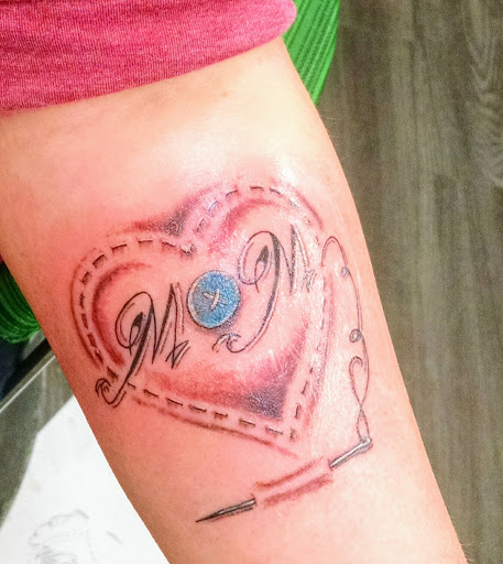Explore family silhouette tattoo ideas, creative tattoo ideas in Sioux City, available at Maya Modification