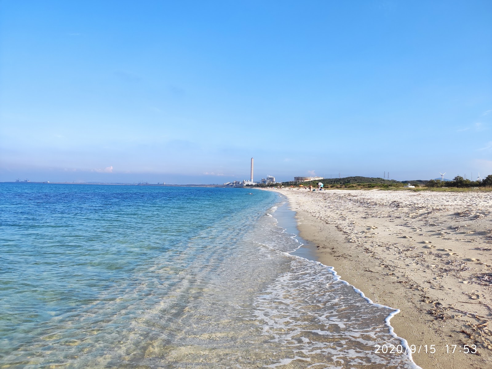 Fotografija Spiaggia di Stagno di Pilo z svetel pesek površino