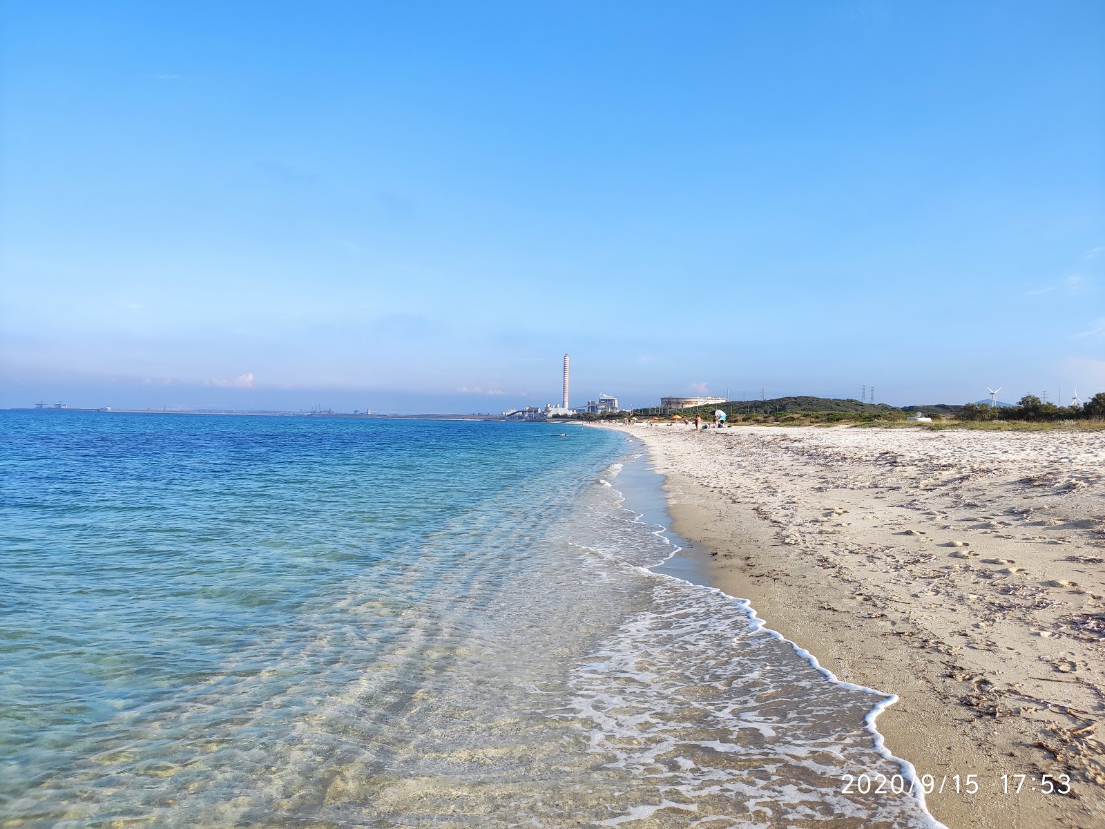 Foto von Spiaggia di Stagno di Pilo mit beiger sand Oberfläche
