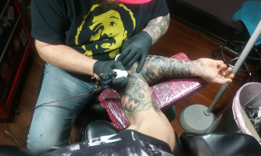 Tattoo Shop «Moth Studio», reviews and photos, 428 W Commercial St, Springfield, MO 65803, USA