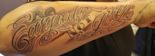Explore female lion tattoo ideas, creative tattoo ideas in Lockport, available at Tattoo City by Larry Brogan