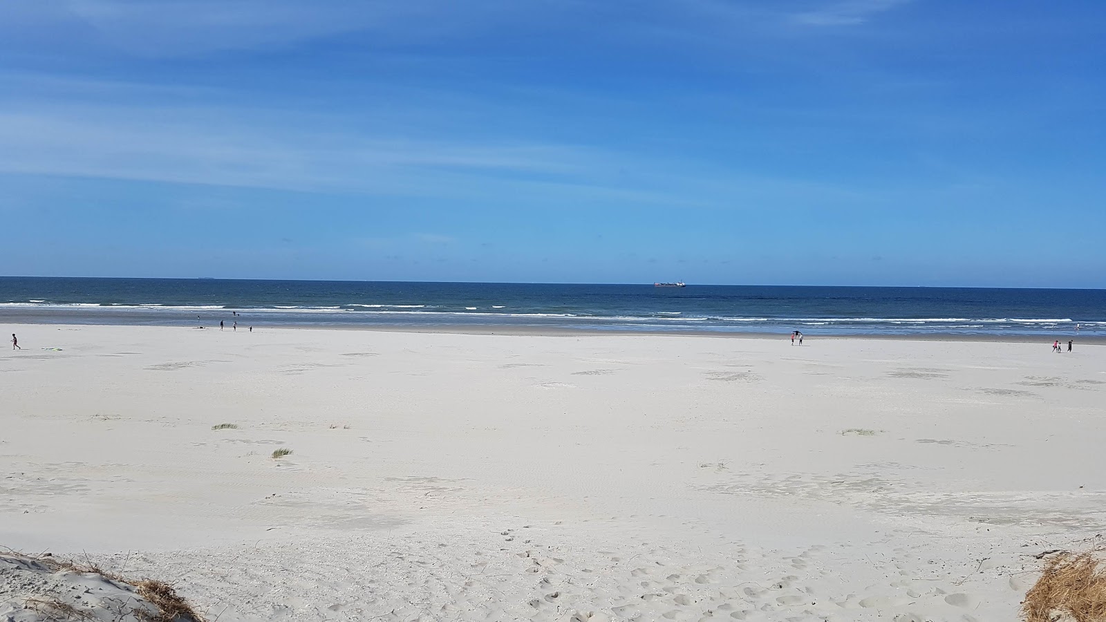 Foto di Spiaggia di Ameland con dritto e lungo