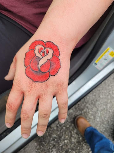 Explore calf tattoo ideas for men, creative tattoo ideas in Angola, available at Hoodlum Ink