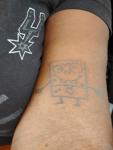 Explore female neck tattoo ideas, creative tattoo ideas in Duncanville, available at Studio Fourteen Tattoos