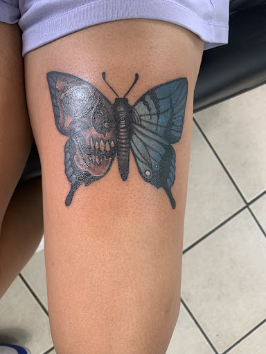 Explore surfboard tattoo ideas, creative tattoo ideas in Lexington, available at Dream chaser tattoos