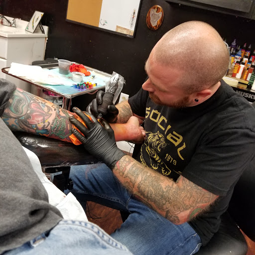 Explore beauty and the beast tattoo ideas, creative tattoo ideas in Powell, available at Against All Odds Tattoos and Piercings