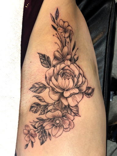 Explore cyberpunk edgerunners tattoo ideas, creative tattoo ideas in Medford, available at Chromatic Tattoo Studio & Body Piercing