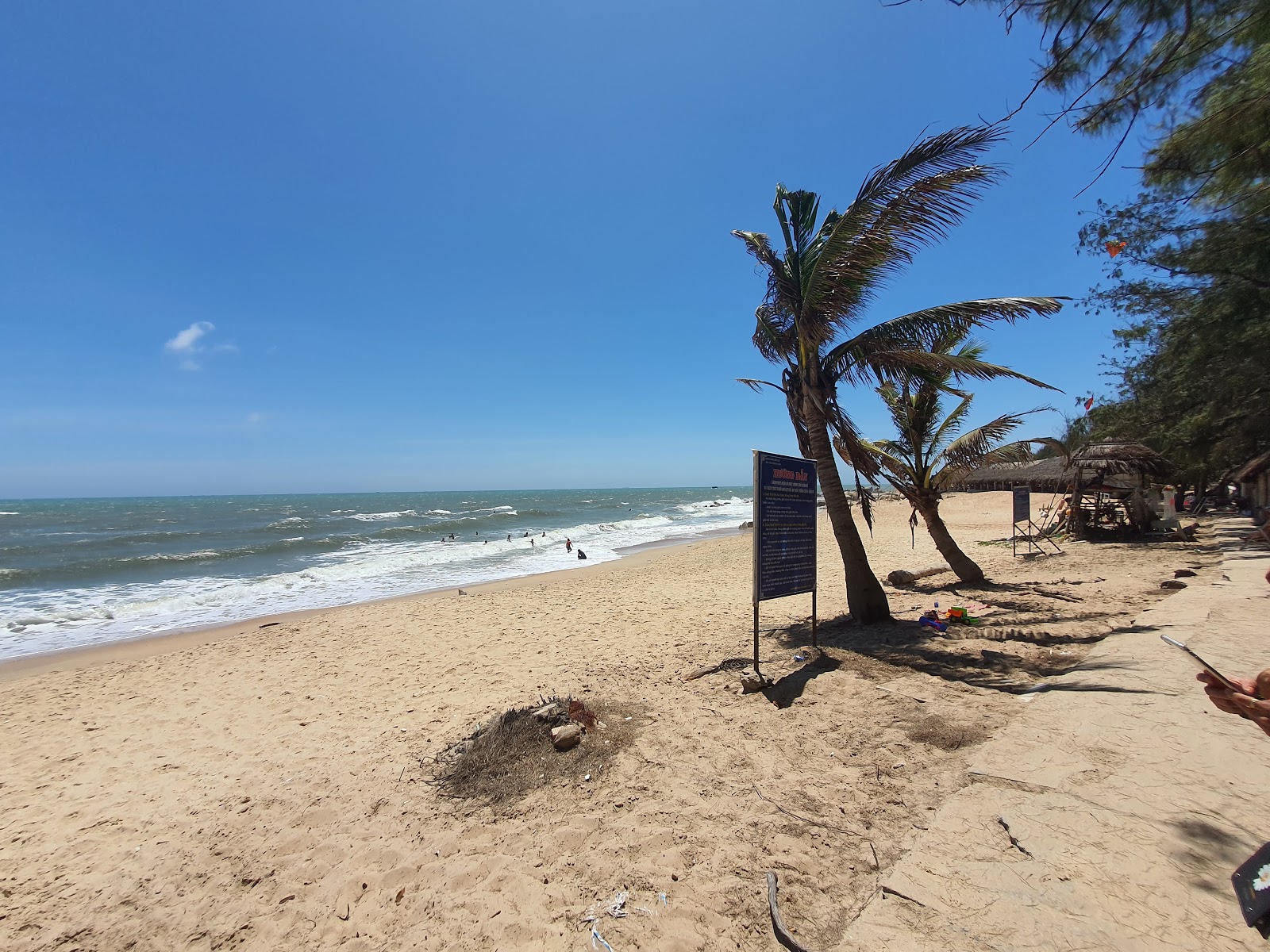 Foto van Oceanami beach met beige zand oppervlakte