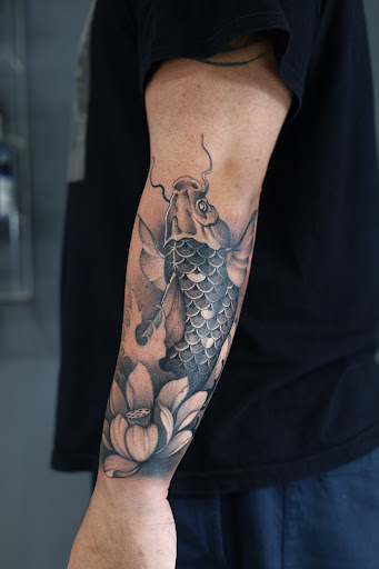 Explore midsommar tattoo ideas, creative tattoo ideas in Southfield, available at Enki Tattoo