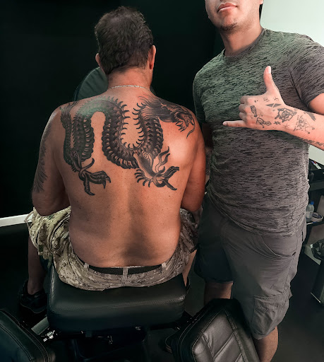The Santos Tattoo - Piercing