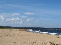 Zdjęcie Corrigans Beach z powierzchnią turkusowa czysta woda