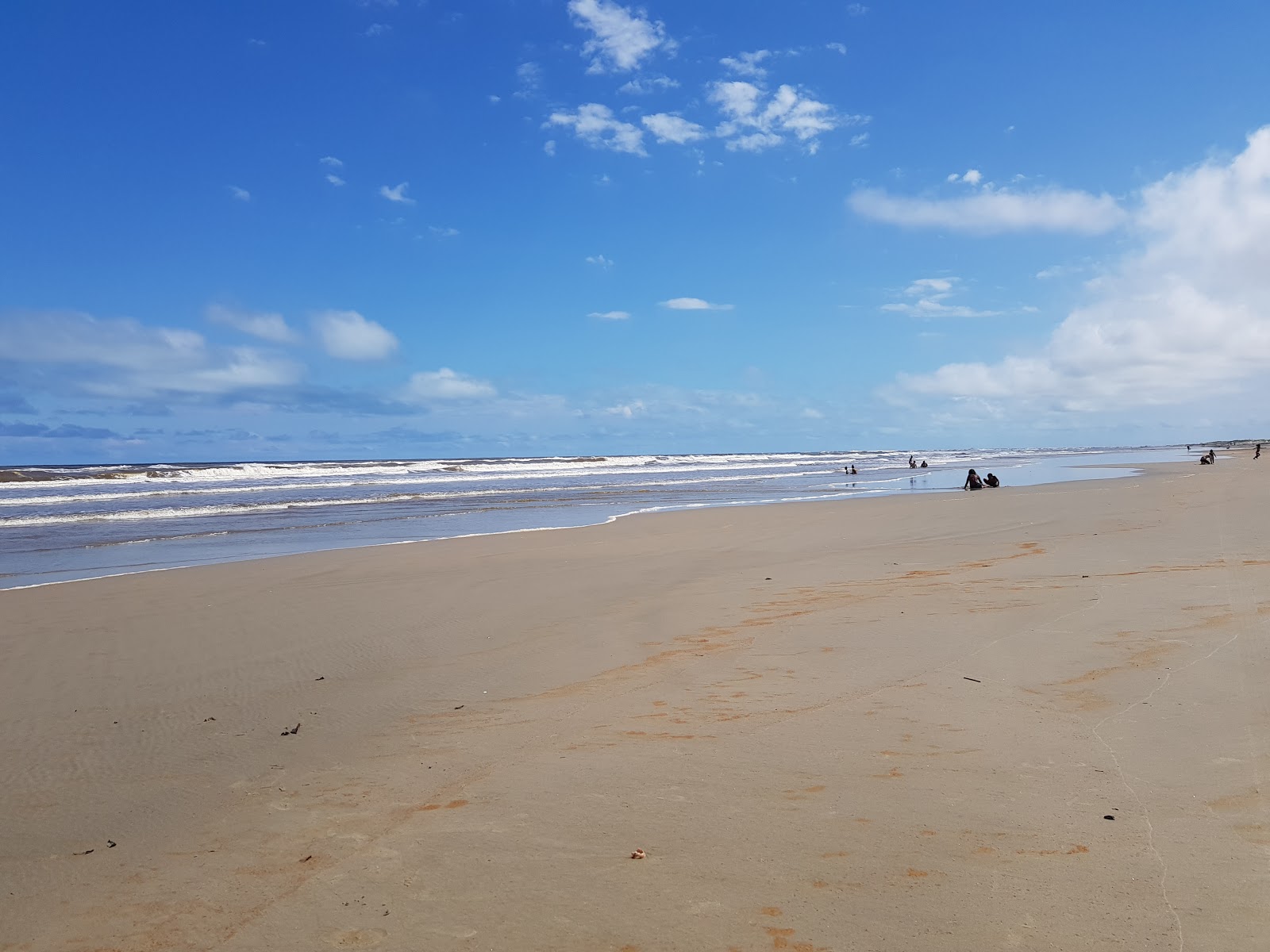 Foto de Praia de Barra Velha con arena beige superficie