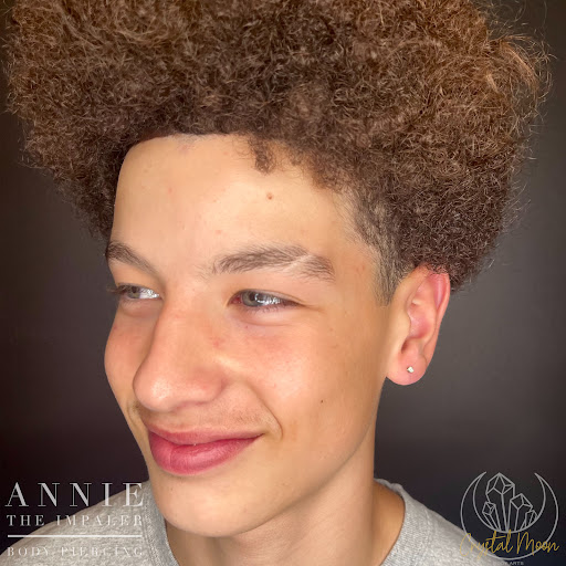 Explore climbing tattoo ideas, creative tattoo ideas in Bloomington, available at Crystal Moon Body Arts