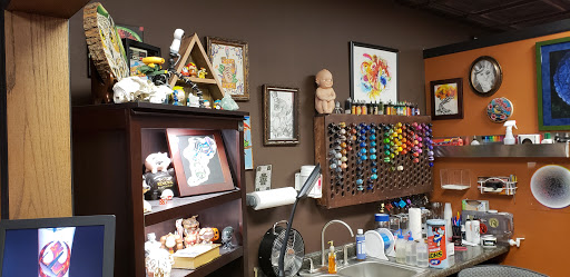 Explore feminine leg tattoo ideas, creative tattoo ideas in Oshkosh, available at Big Guns Tattoo Oshkosh