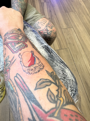 Explore lion tattoo ideas, creative tattoo ideas in Cocoa Beach, available at 13 Waves Tattoo