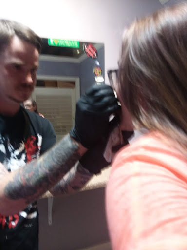 Explore black female tattoos ideas, creative tattoo ideas in Greer, available at Some Prix Piercing