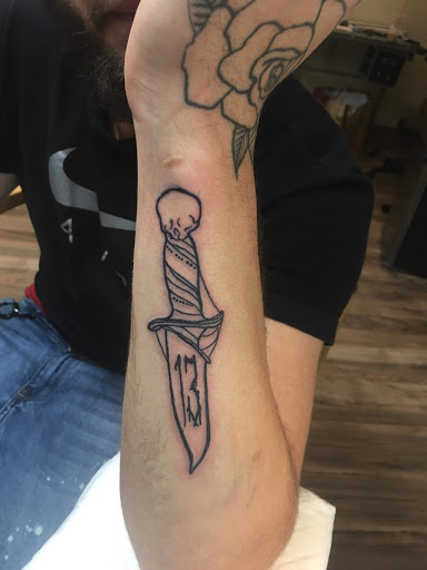 Explore afro tattoo ideas, creative tattoo ideas in Hudson Falls, available at ALTERED ADDICTION TATTOOS