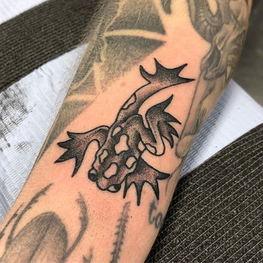 Explore wolf neck tattoo ideas, creative tattoo ideas in Snohomish, available at Unknown Tattoo Co.