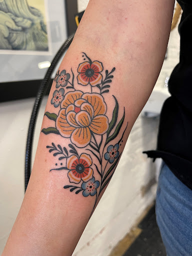 Explore butterfly and flower tattoo ideas, creative tattoo ideas in Tallahassee, available at Hot Love Tattoo