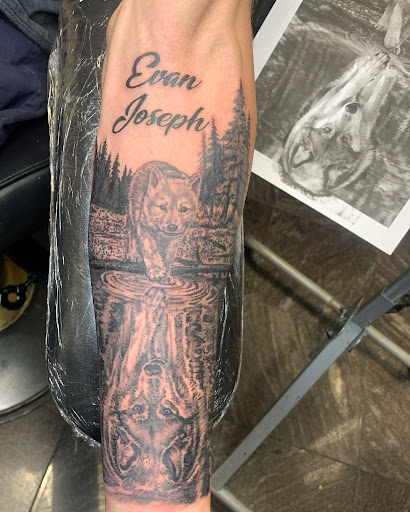 Explore tattoo ideas of strength, creative tattoo ideas in Lagrangeville, available at Black Cherry Tattoo Studio NY