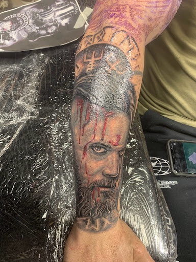 Explore family tree tattoo idea, creative tattoo ideas in Sarasota, available at SEVEN SINS Tattoo Studio