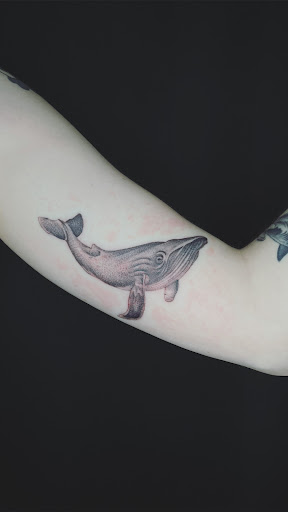 Explore footprints in the sand tattoo ideas, creative tattoo ideas in Cadillac, available at Limitless Ink Tattoo Studio