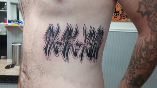 Tattoo Shop «magnum opus tattoo company», reviews and photos, 1817 Padre Blvd #4, South Padre Island, TX 78597, USA