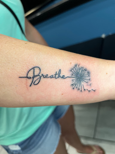 Explore dad tattoo ideas for daughter, creative tattoo ideas in Foley, available at Symbolic Ink Tattoo Studio